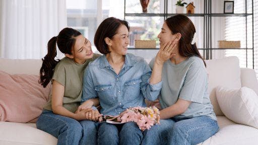 A mother and her daughters spending quality time together.