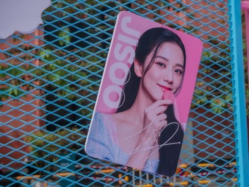 A photo card featuring Jinsoo of BLACKPINK. 